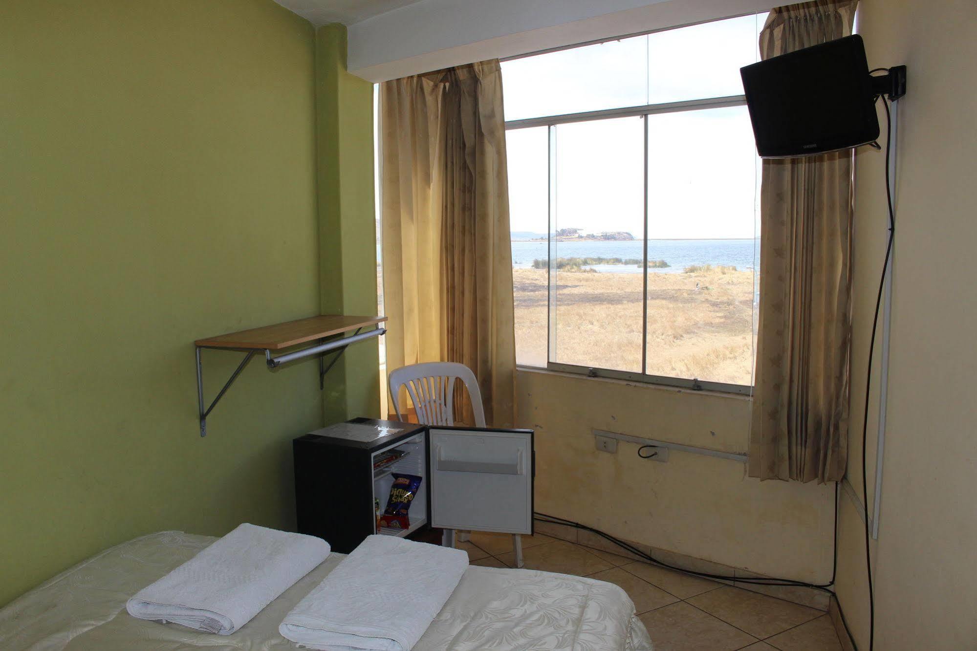 Posada De Percybal Lago Inn Puno Extérieur photo